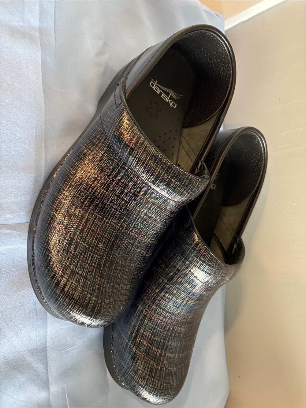 Dansko Women’s Iridescent Black Multitone Slip-On Clogs